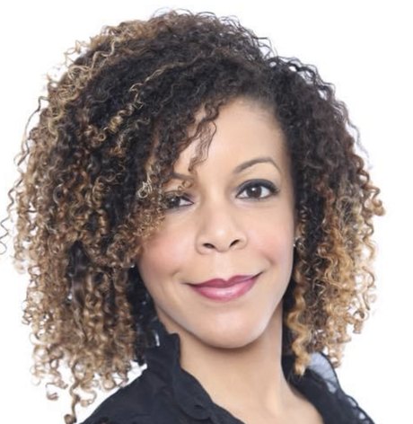 Lilyvette Perez, LMHC, LPC, NCC, BC-TMH, in a professional portrait